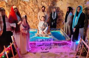 تجسيد معمودية المسيح في عمل فني احتفالا بعيد الغطاس بالمنيا (فيديو)