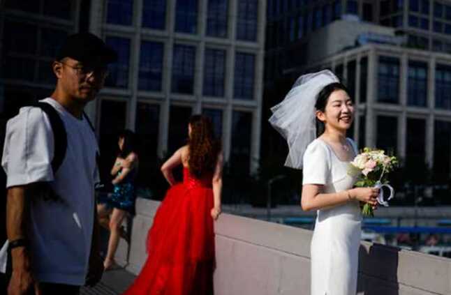 الصين تدعو مواطنيها لترشيد نفقات حفلات الزفاف.. ما السبب؟ | المصري اليوم