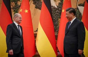 الرئيس الصيني والمستشار الألماني يبحثان عددًا من القضايا الدولية المشتركة