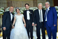 مرتضى منصور والإعلامي أحمد موسى مع العروسين