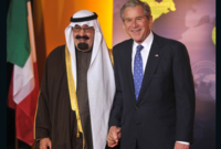 مع الرئيس الأمريكي السابق جورج بوش
