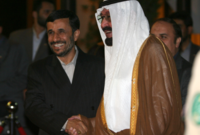 مع الرئيس الإيراني السابق أحمدي نجاد