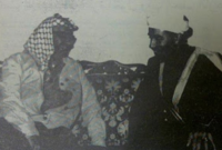 لقطة له مع الزعيم الفلسطيني الراحل ياسر عرفات 