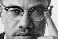 وفي عام 1964 أسس منظمة الوحدة الإفريقية الأمريكية، التي دافعت عن هوية السود وأكدت أن العنصرية، وليس البيض، هي المصيبة الأعظم التي تواجه الأمريكيين الأفارقة